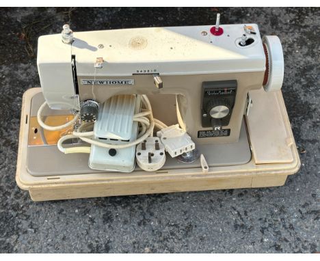 Vintage cased new home electric sewing machine model 543210