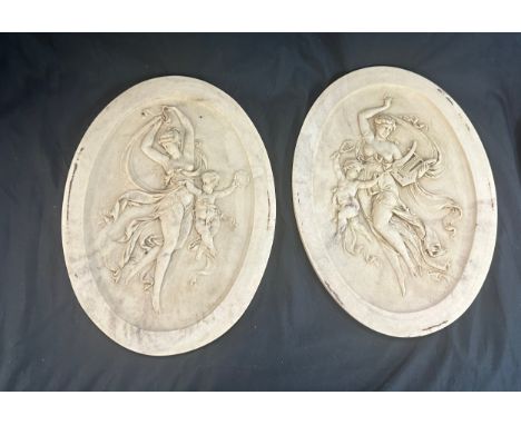 2 Vintage oval marble wall plaques, cherub design, each measures approximately 13 inches tall 10 inches wide