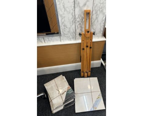 Vintage artist easel and a selection of canvases 