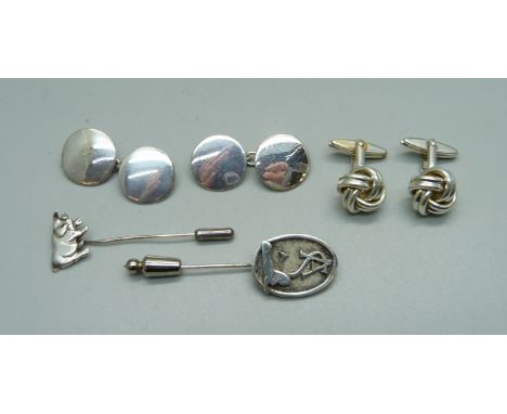 Two pairs of silver cufflinks and two stick pins 