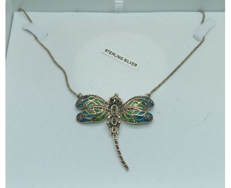 A silver plique a jour dragonfly pendant and chain 