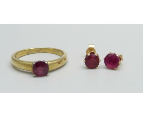 An 18ct gold and ruby solitaire ring and a pair of 9ct gold and ruby earrings, ring 3.2g, M 