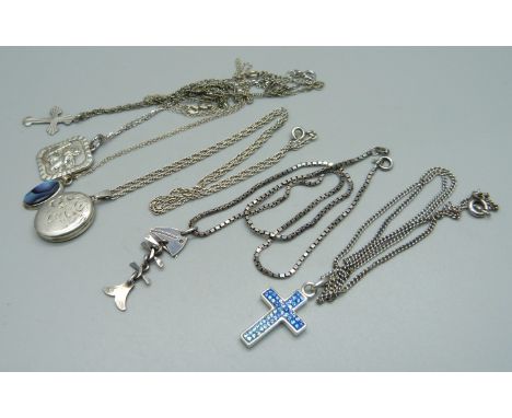 A silver locket and chain and five silver pendants and chains, 30g 
