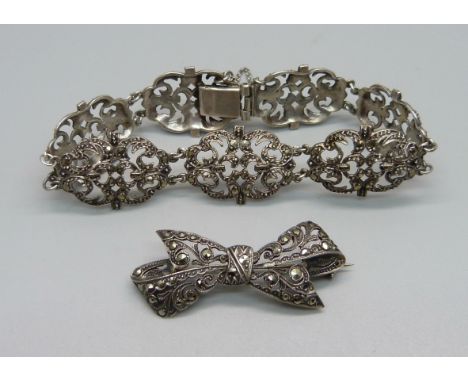A 935 silver and marcasite bracelet and a 925 silver brooch 