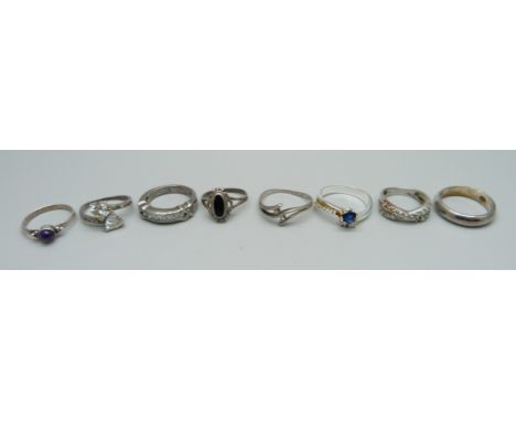 Eight silver rings 