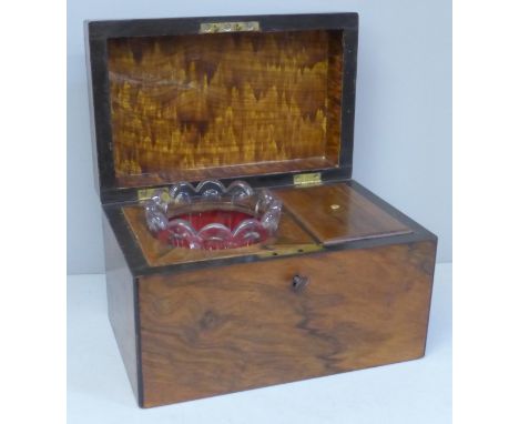 A 19th Century walnut tea caddy with glass jar and key 