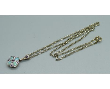 A 9ct gold, opal and ruby set pendant and chain, 4.7g, 38cm 