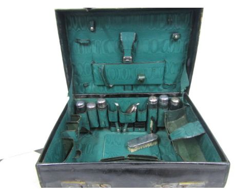 Leather British Army General Corps late Victorian vanity case with silver hallmarked topped bottles, a notebook, ink and ligh