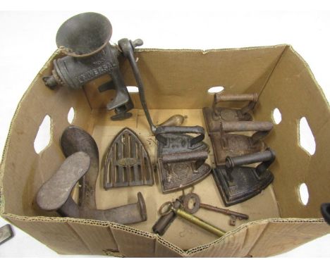 Flat irons and trivet, shoe last and vintage mincer, brass scales and keys