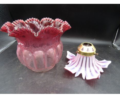 2 antique glass light shades. Both in good condition. larger has fit hole 10cm and 16cmH the smaller has fit hole of 3cm and 