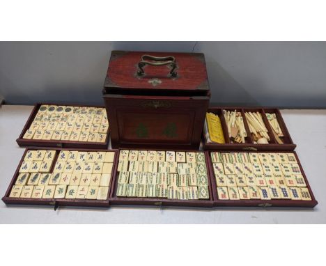 A mid century Mahjong set in a box with five graduated drawers and applied metal mountsLocation: 