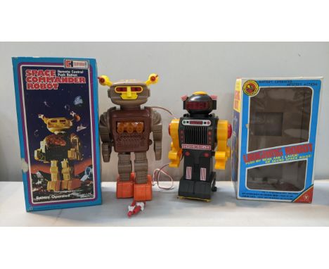 Two boxed vintage robot toys to include a Clifford Toys Space Commander Robot and a Yonezawa Laughing RobotLocation: 