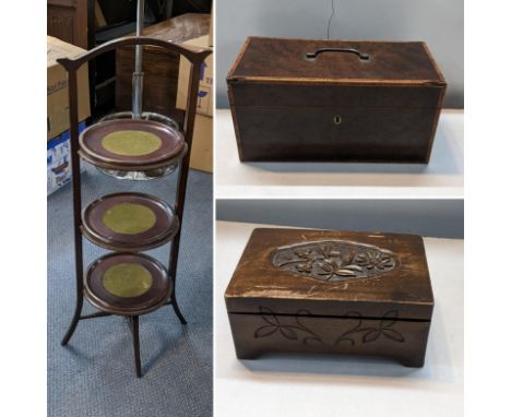 An early 19th century burr yew tea caddy together with a cake stand and a music boxLocation: 