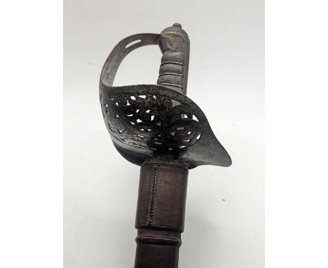 A 1897 pattern British infantry officers sword by Wilkinson, the 81.5cm blade stamped '37814' the hilt designed with the cyph