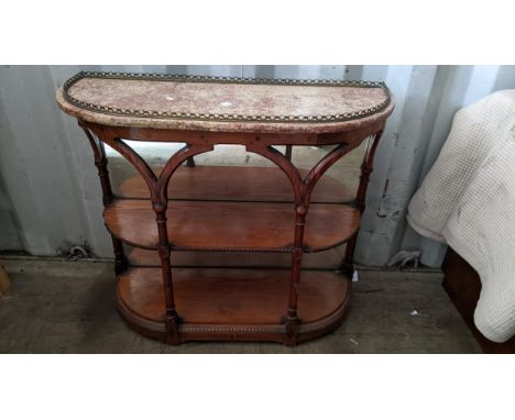 A pine and marble topped side table having a brass gallery top, mirrored back and two open shelves 79.5h x92.5wLocation 