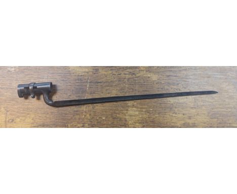 A British 1853 patter socket bayonet made by G.W. & E. Roe of Birmingham the 43cm triangular blade having three deep fullers,