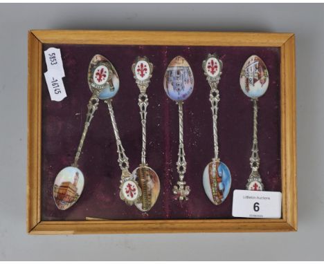 Cased white metal and enamel teaspoons 