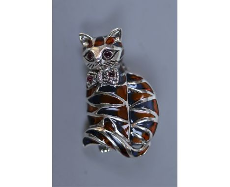 Silver and enamel ruby eyed cat brooch 