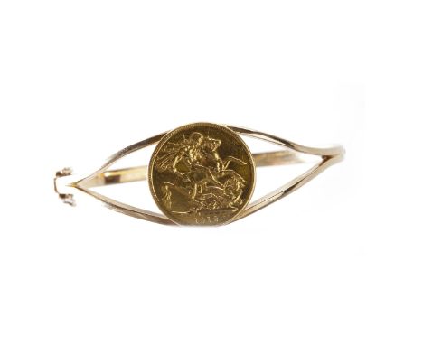 GOLD SOVEREIGN DATED 1912mounted to an unmarked bangle, 22.7g gross