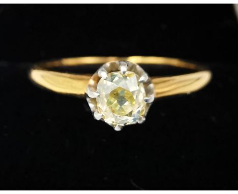 An antique yellow metal (tests as 18ct) old mine diamond ring, set with a cushion shape old mine cape diamond with an approxi