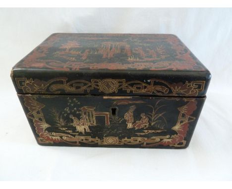 An English Chinoiserie lacquered small tea caddy, decorated with figures in a garden in red outlined with gilt on a black gro