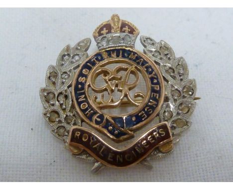 British Army Interest - Royal Engineers, a diamond chip set sweet heart brooch, of cap badge form, set in yellow and white me