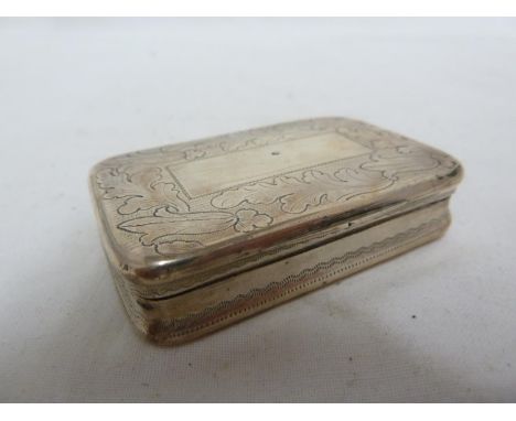 A Georgian silver snuff box, the covers decorated with  borders of stiff leaves about a vacant rectangular reserve, gilt wast