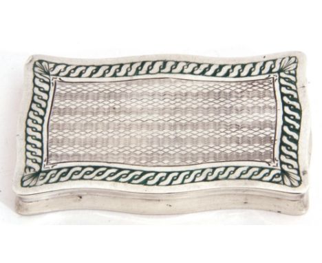 Continental white metal shallow lidded box of serpentined rectangular form, the lid green enamelled and engine turned decorat