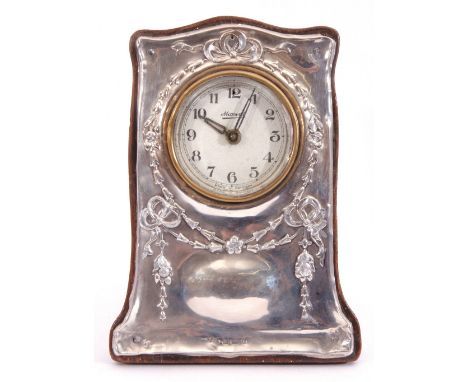 Edward VII silver mounted mantel clock, the dial printed "Maxwal, made in Germany", the silver front with ribbons and flowers