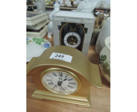 A Quartz carriage clock and a mantle clock 