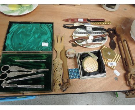 A miscellaneous selection including an engine tooled cigarette case, two compact mirrors, a selection of wrist watches, treen