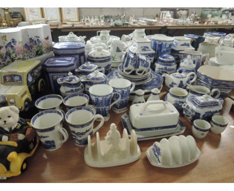 A collection of Ringtons tea collectables including tablewarem, vases, vintage tins, Wade toast rack, tea caddy etc