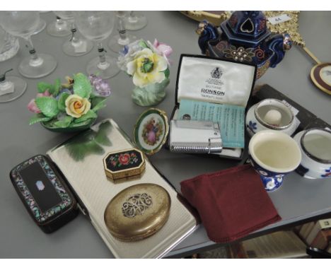 An engine tooled cigarette case, a mother of pearl inlayed snuff box, a Ronson lighter, a Germaine Monteil compact etc