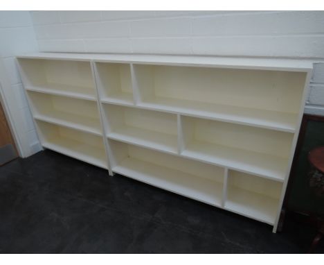 Two painted shelf units, labelled Hussif 