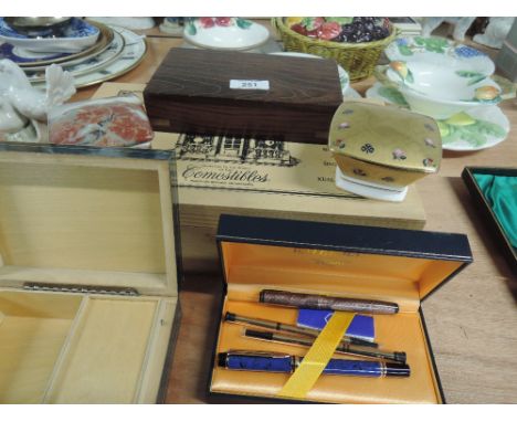 A Swan lever fill fountain pen and Waterman ball point, treen boxes and ceramic trinkets