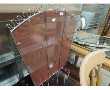 An Art Deco style chrome fire guard/screen