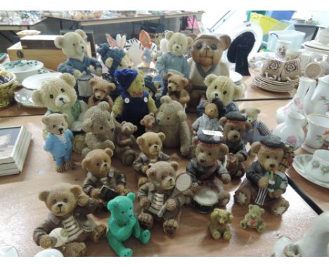 A collection of ceramic teddy bears