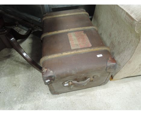 A vintage cabin trunk and contents