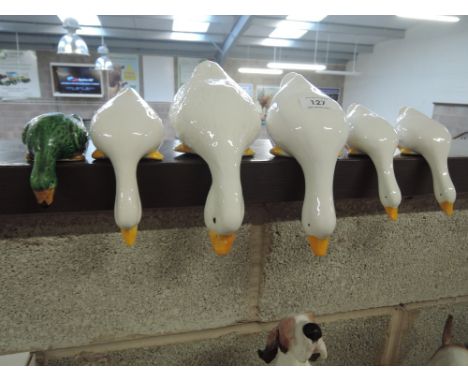Six ceramic shelf ducks