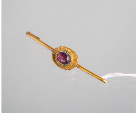 Brosche in Stabform 585 GG (wohl 1950er Jahre), besetzt mit: 1 oval geschl. Amethyst,gestempelt: Feingehalt, L. ca. 5,2 cm, G