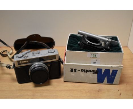 A vintage Canon Canonette Junior 35mm camera, and a set of Minolta camera bellows