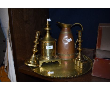 A 19th Century copper and brass pitcher, measuring 24cm tall, a pair of candlesticks, a brass tobacco box, coin dispenser, an