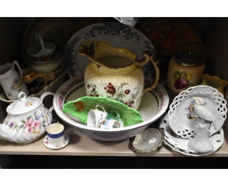 A mixed lot of vintage and antique ceramics, including wash basin, large jug, teapot, biscuit barrel, platter etc.