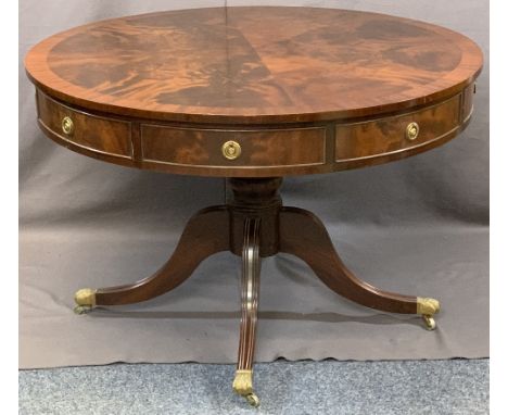 REPRODUCTION MAHOGANY DRUM TOP LIBRARY TABLE, the crossbanded top with segmented flame mahogany veneer over a frieze of four 