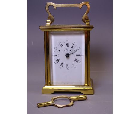 VINTAGE BRASS CASED CARRIAGE CLOCK WITH KEY, the dial marked 'Boodle &amp; Dunthorne', 14.5cms H handle up, the movement back