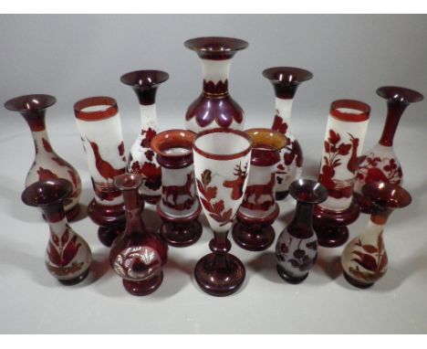 ETCHED RUBY RED VASES, a collection of 14