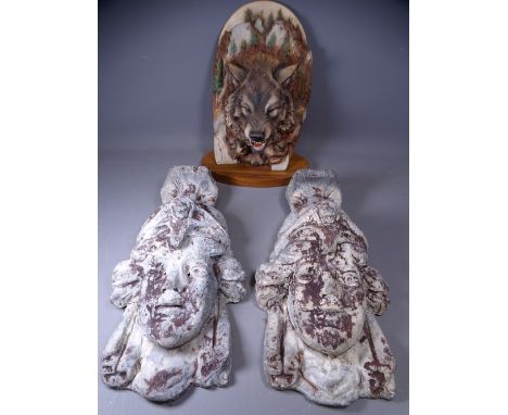 LEAD WALL PLAQUES, a pair depicting Greek military heads, 44cms H, and a Canadian wolf model by Paul R Carris ??? entitled 'M