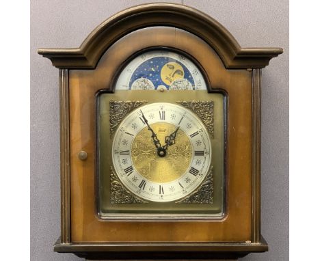 WALT REPRODUCTION WALNUT GRANDMOTHER CLOCK with moon face detail to an arched dial before a pendulum driven twin weight movem