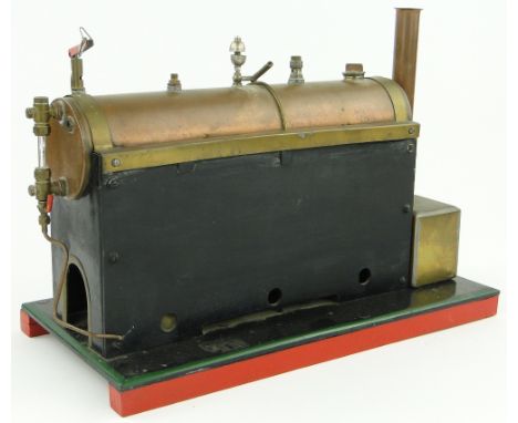 A scratch-built live steam powered stationary engine,
length 15".