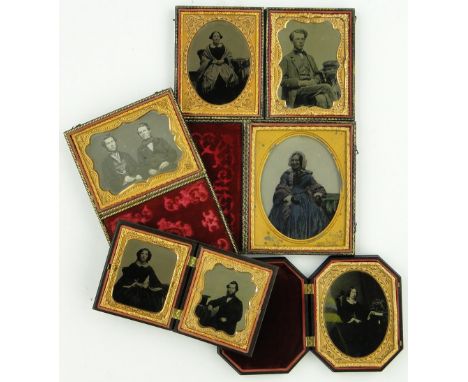 4 cased Victorian daguerreotype photographs 
and another cased portrait, (5).